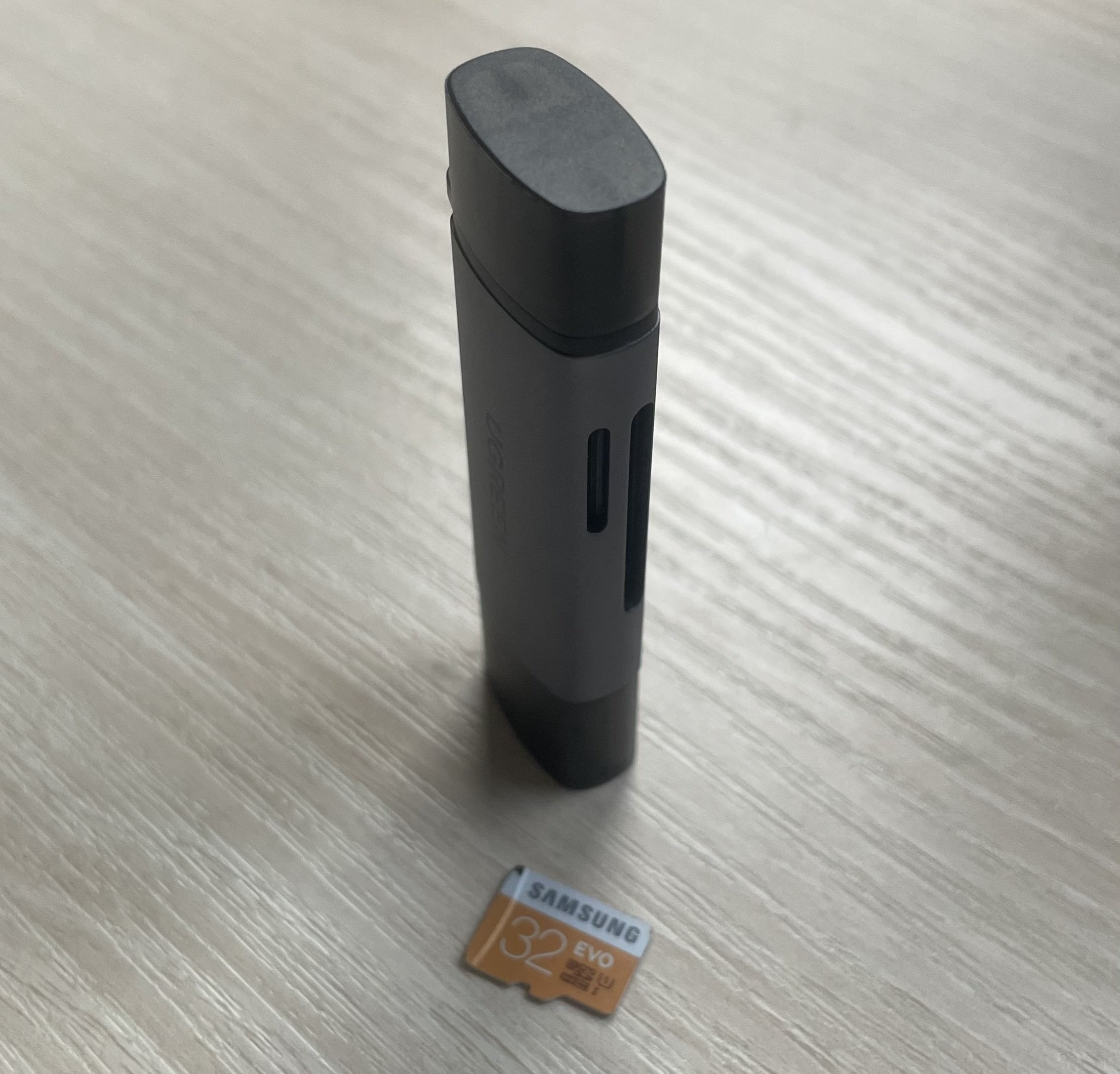 A microSD card and its reader